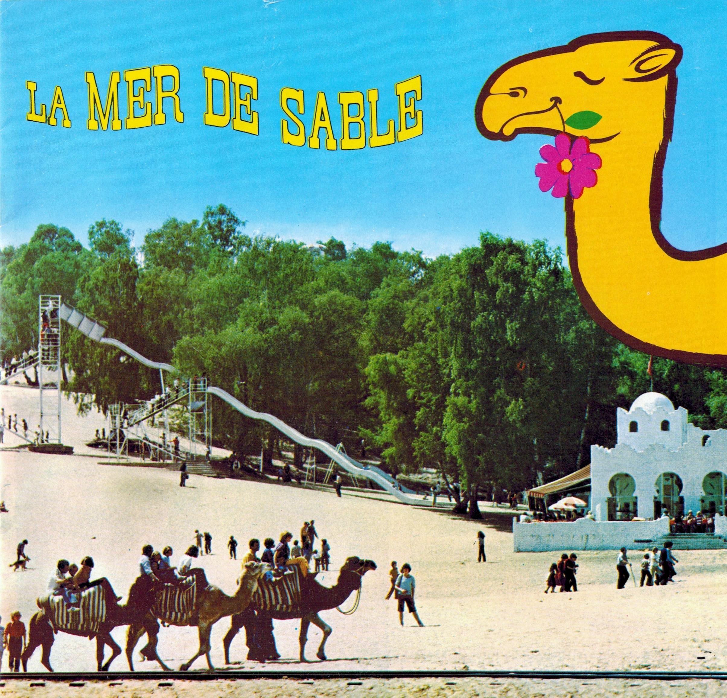 Image publicitaire de la Mer de Sable, avec des chameaux et un grand toboggan